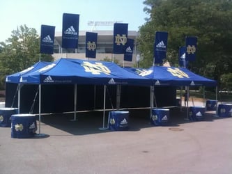 10x20 pop up tents with custom peak flags for Adidas & Notre Dame partnership