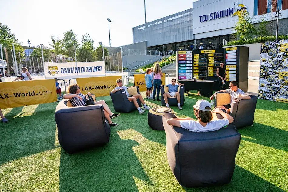 Premier Lacrosse League Fan Area With Inflatable Furniture & Barricade Covers