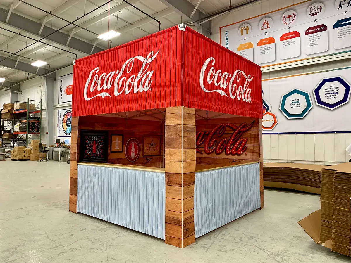 Coke cube tent with rigid wrapped legs.