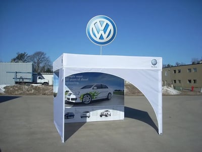 VW MONARCHFLATROOF tent with rigid lollipop sign.