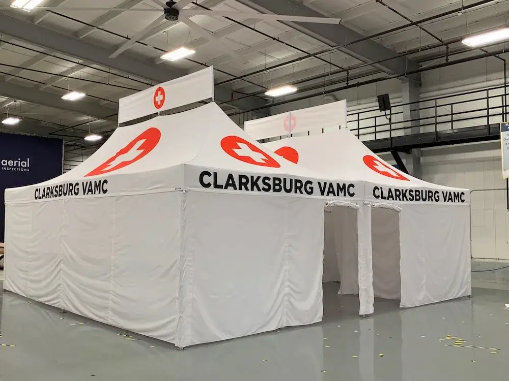 side view of the 26x26 custom infirmary pop up tent with eight rooms built for the Clarksburg VA medical center