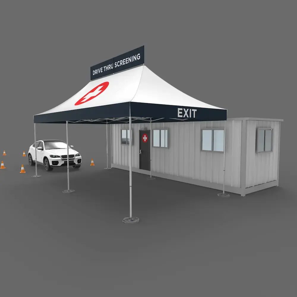 drive thru medical tent for coronavirus screening with a banner at the top and a red cross printed on to the canopy