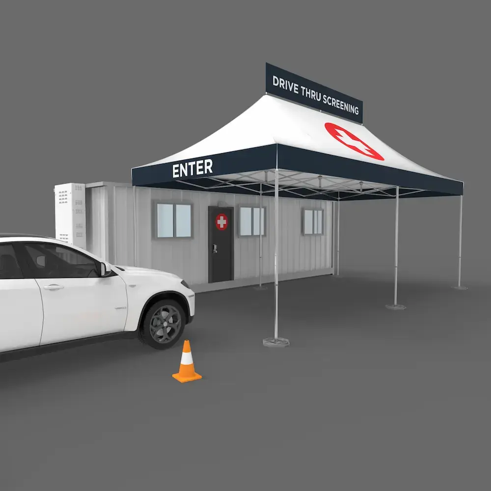 car pulling into the entrance of a drive thru medical tent for coronavirus screening