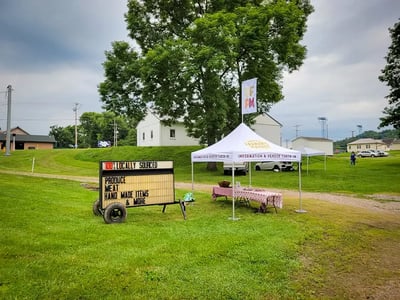 Information tent at farmers market