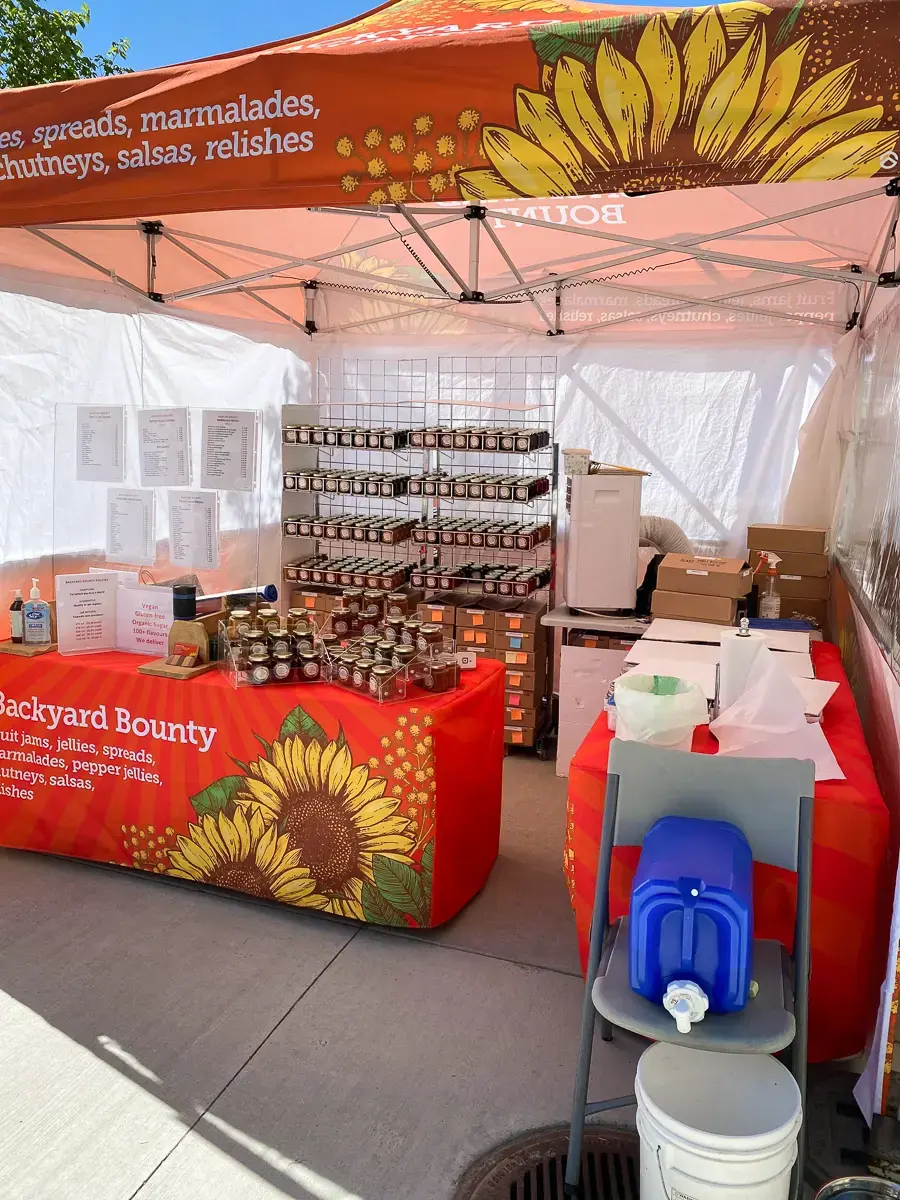 farmers market tent with matching custom table cover